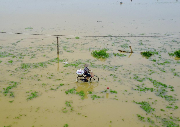 Alluvione a Chuong My, vicino Hanoi, in Vietnam © EPA