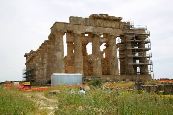 Temples are 'caged' against the ravages of time by scaffolding in the 270-hectare Selinunte archaeological park near Trapani