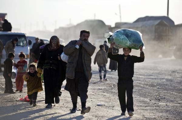 Siriani in fuga dalla guerra