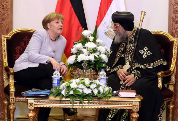 Angela Merkel con il pope copto Tawadros II