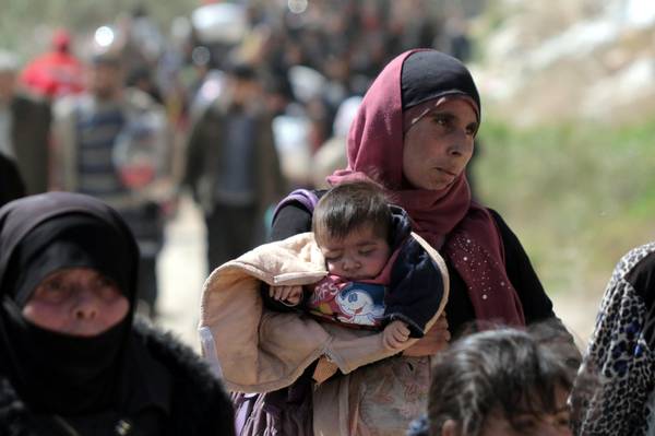 Civili siriani in fuga dalla guerra