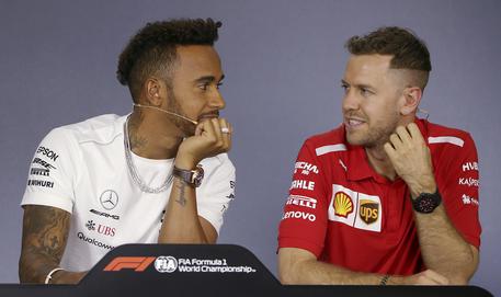 Lewis Hamilton e Sebastian Vettel © AP