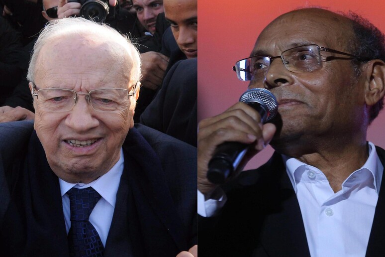 Il leader di Nidaa Tounes, Beji Caid Essebsi (s) e il presidente  'provvisorio ' Moncef Marzouki (d), i due candidati alle presidenziali tunisine che andranno al ballottaggio -     RIPRODUZIONE RISERVATA