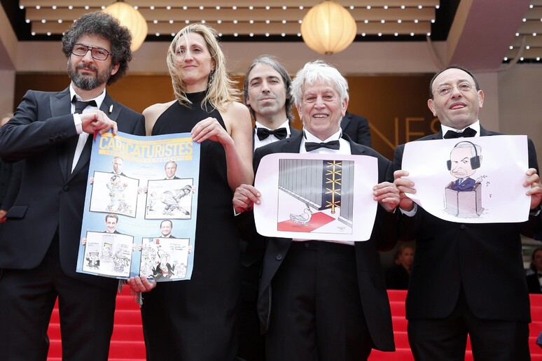 Baha Boukhari (secondo da destra) al 67.mo festival di Cannes (2014) -     RIPRODUZIONE RISERVATA