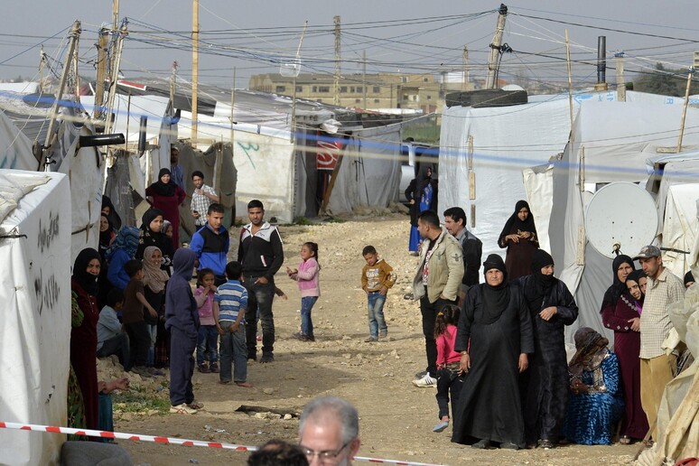 Rifugiati siriani in un campo nella valle della Bekaa in Libano -     RIPRODUZIONE RISERVATA