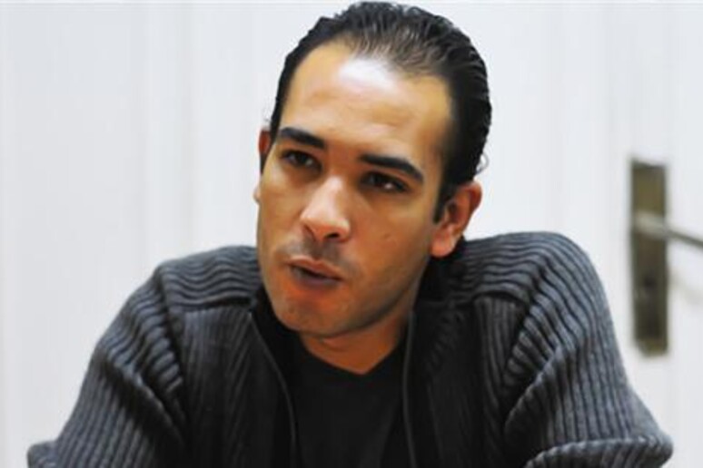 Il noto attivista egiziano Malek Adly, avvocato del Centro egiziano per i diritti economici e sociali -     RIPRODUZIONE RISERVATA