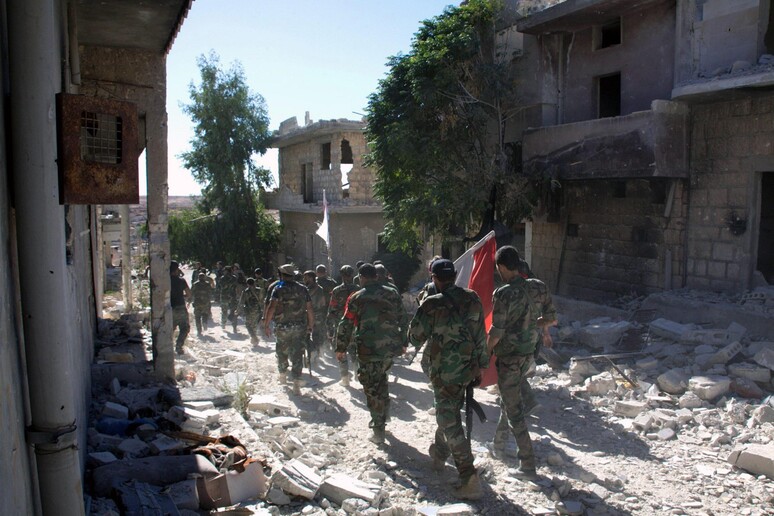 Esercito siriano ad Aleppo © ANSA/EPA
