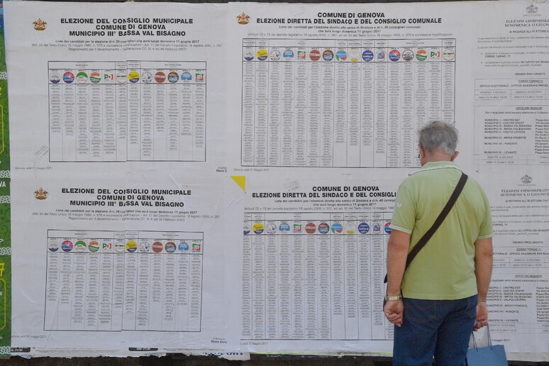 Comunali Genova: manifesti elettorali - RIPRODUZIONE RISERVATA