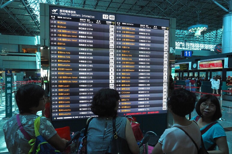 Display dei voli in un aeroporto di Taiwan - RIPRODUZIONE RISERVATA