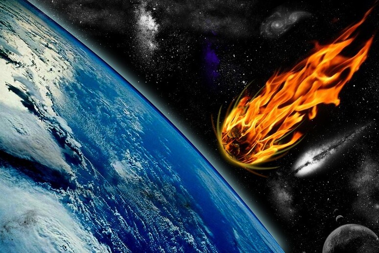 Rappresentazione artistica di un asteroide che sta per cadere nell 'oceano (fonte: Needpix) - RIPRODUZIONE RISERVATA