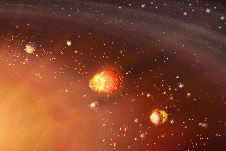Rappresentazione artistica della formazione del Sistema Solare in due fasi (fonte: Mark A Garlick / markgarlick.com) - RIPRODUZIONE RISERVATA