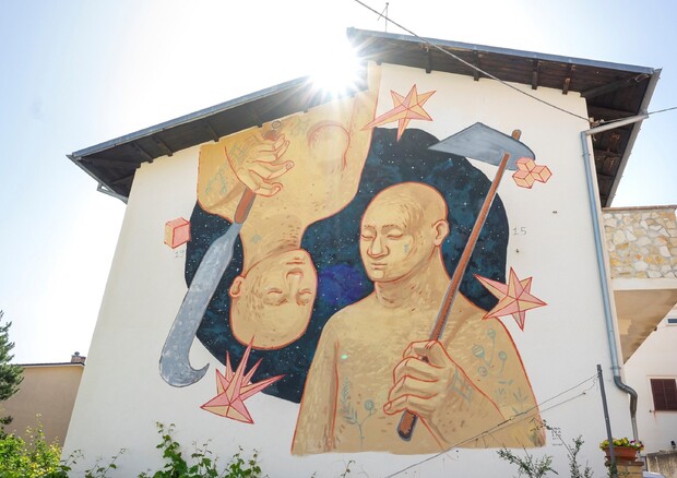 Street art a 'Borgo Universo', ecco il primo eco-murale (ANSA)