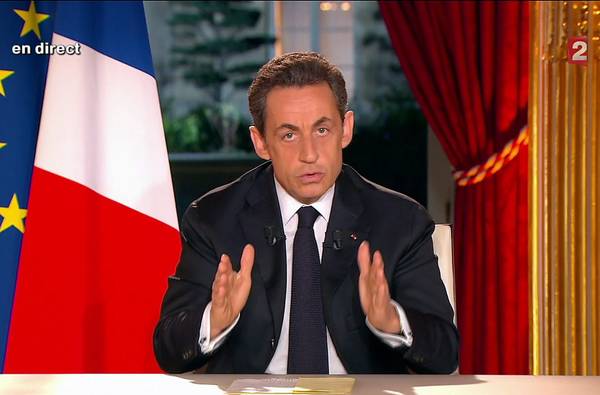 French President Sarkozy live on eight TV stations announces his recipe for growth recovery