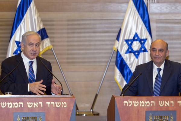 Israeli Prime Minisrer Benjamin Netanyahu and Kadima party leader Shaul Mofaz in Jerusalem on forming a coalition government