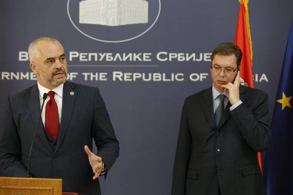 Albanian Prime Minister Edi Rama (L) and Serbian Prime Minister Aleksandar Vucic (C) give a press conference in Belgrade, Serbia