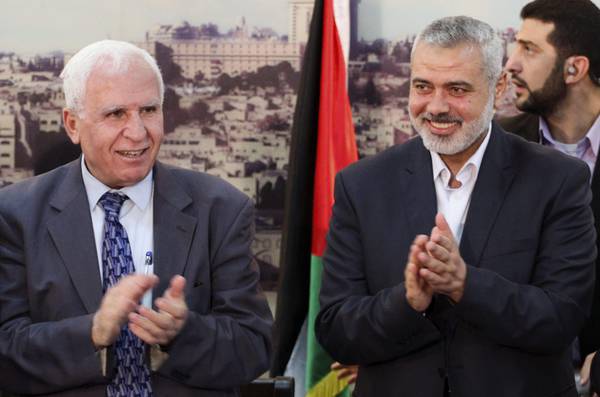 Senior Fatah official Azzam Al Ahmad and Hamas Prime minister Sheikh Ismael Haniyeh