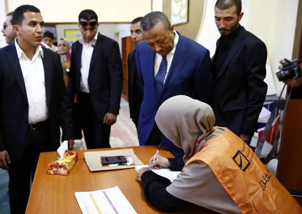Libyans vote for the  new parliament which will take office on Saturday