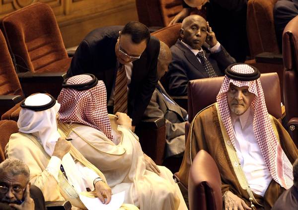 Saudi Arabian Foreign Minister Prince Saud Al-Faysal (R) attends a recent  Arab League  meeting in Cairo.