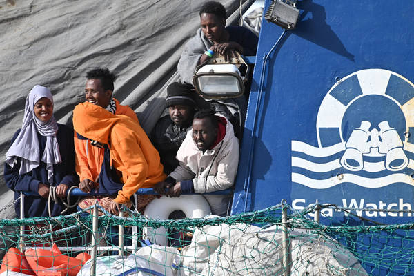 Sea Watch with 194 migrants on board docks at the Nuremburg pier in Messina
