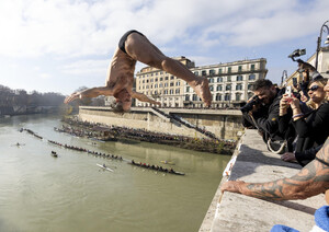 New Year traditional dive in the river Tevere, Rome