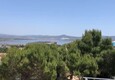 L'esercitazione Nato in Sardegna vista dalla baia di Porto Pino (ANSA)