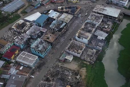La distruzione provocata dalla rivolta a Honiara, capitale delle isole Salomone © AFP