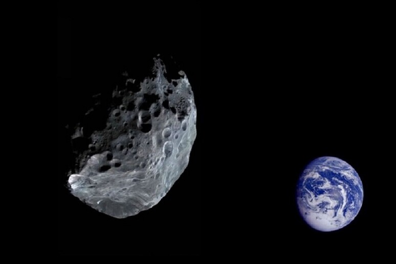 Rappresentazione artistica del passaggio di un asteroide vicino alla Terra (fonte: Pixabay) - RIPRODUZIONE RISERVATA